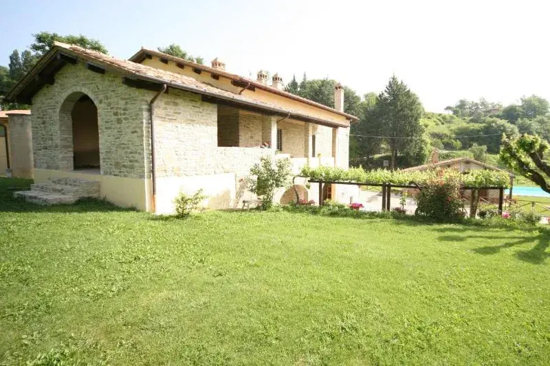 Representative exterior or arrival view for Agriturismo Borgo di Cortolla.